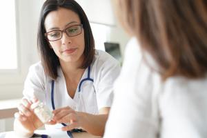 Doctor prescribing medication.